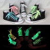 Lacci per scarpe fluorescenti fosforescenti che si illuminano al buio